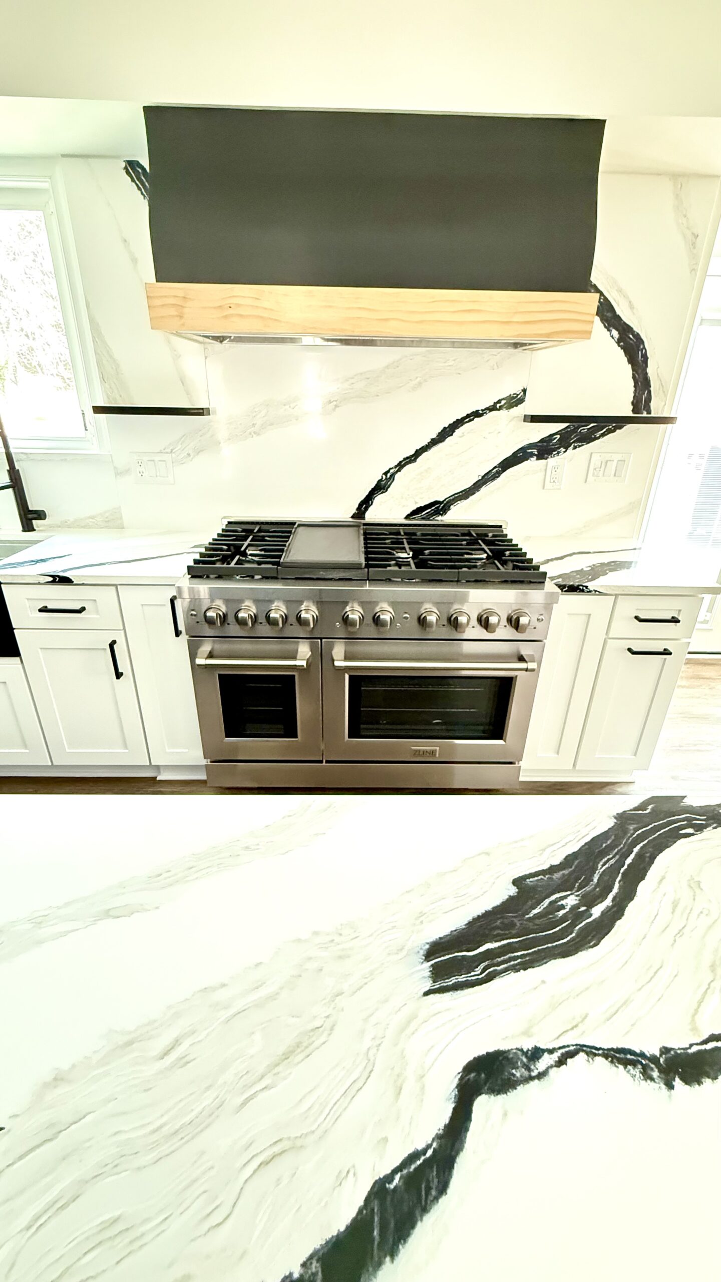 Primary bathroom with large shower and modern finishes