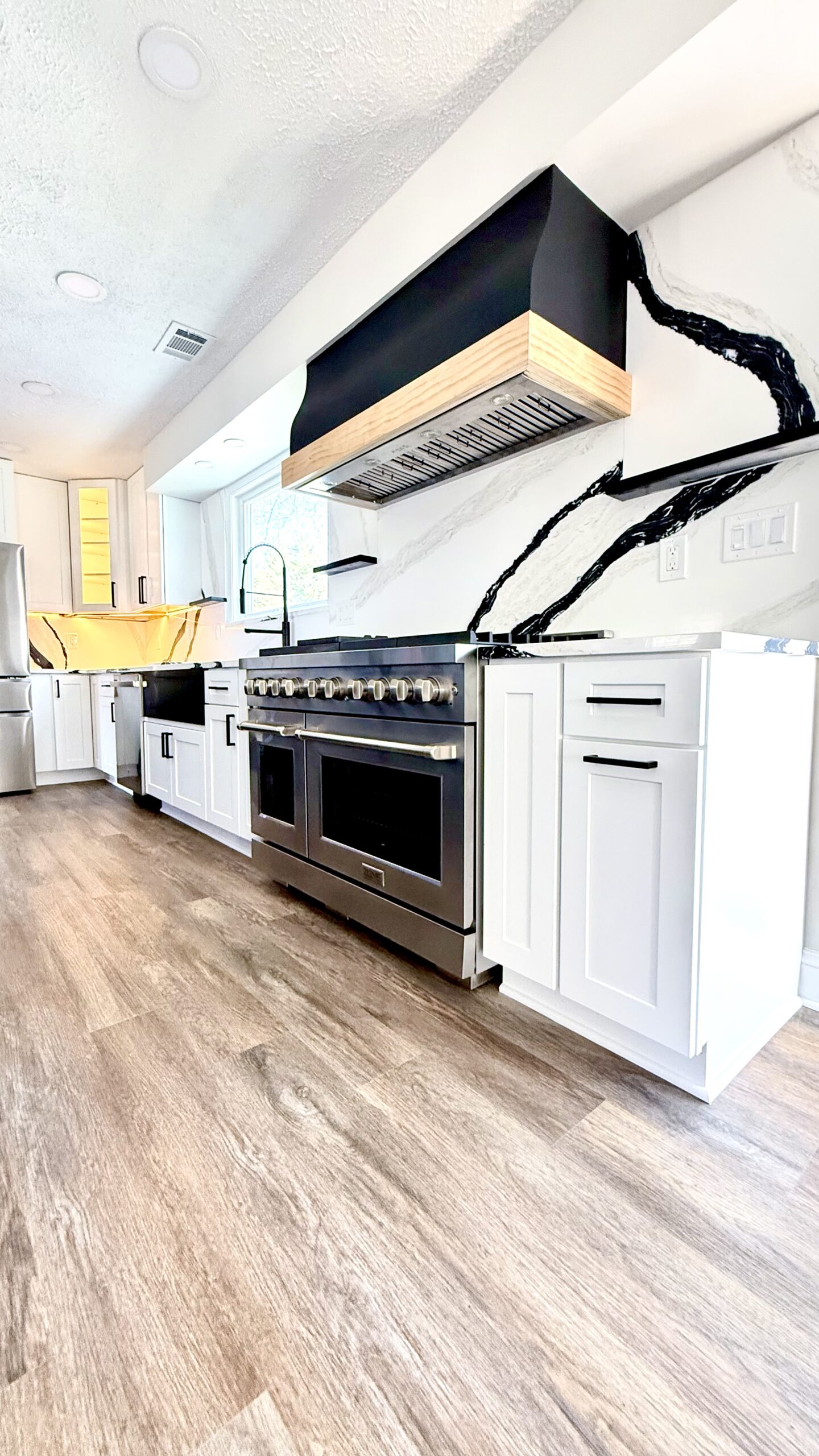 Outdoor living space and deck renovation by MSH Designed Renovations & Construction