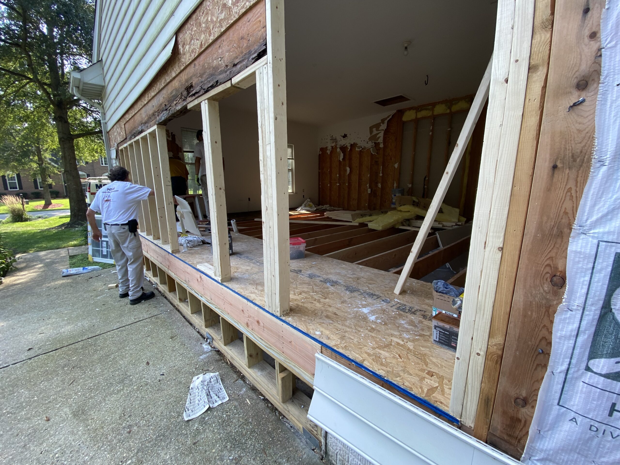 Exterior or transition showing how the new space connects to the rest of the home