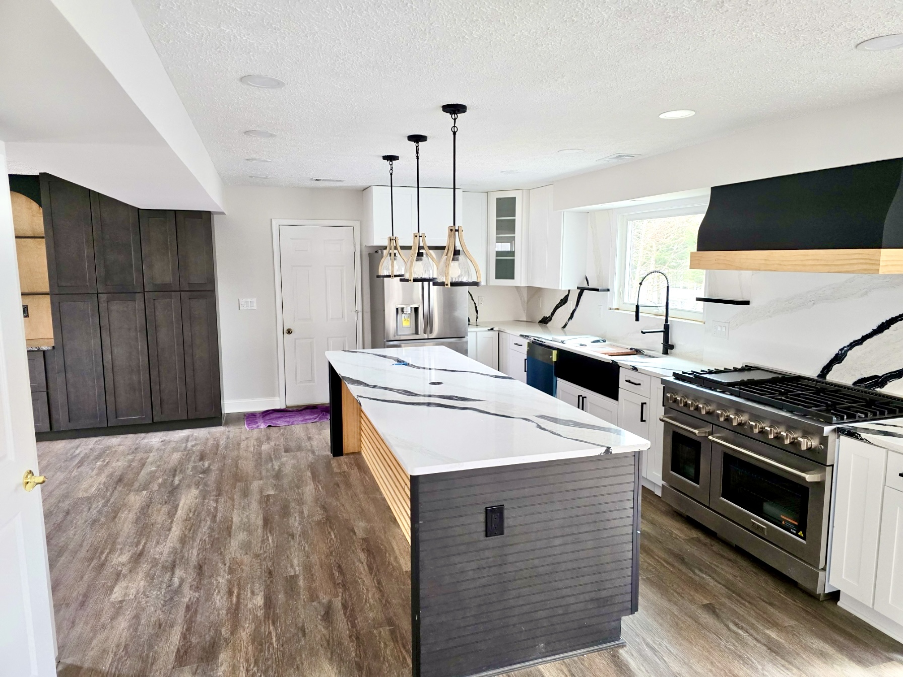 Modern luxe kitchen completed by MSH as part of a guided renovation process