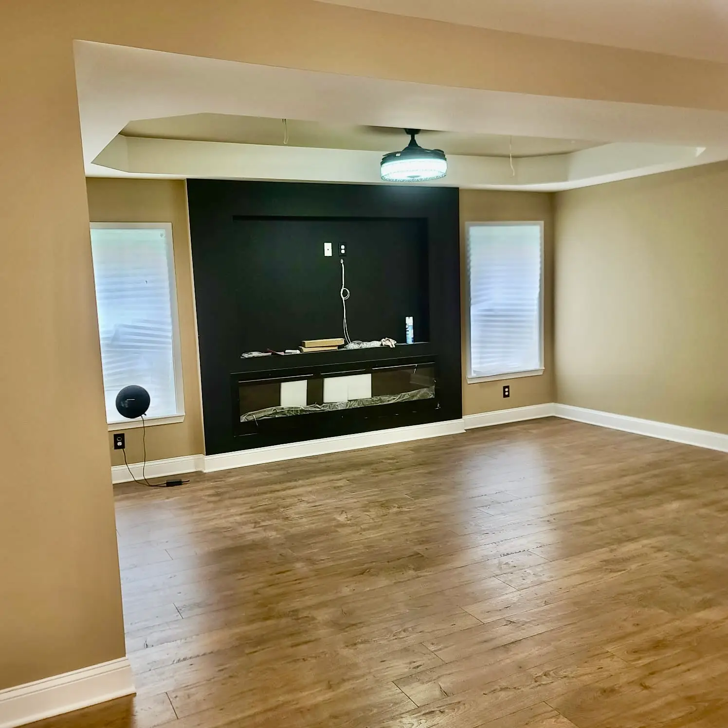 Basement lounge area with sofa and artwork