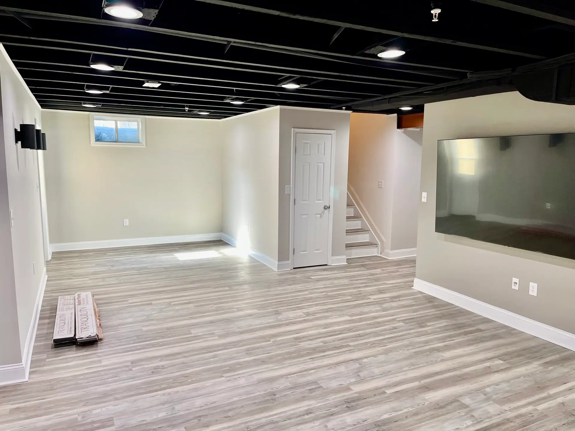 Basement view showing open layout and stairs