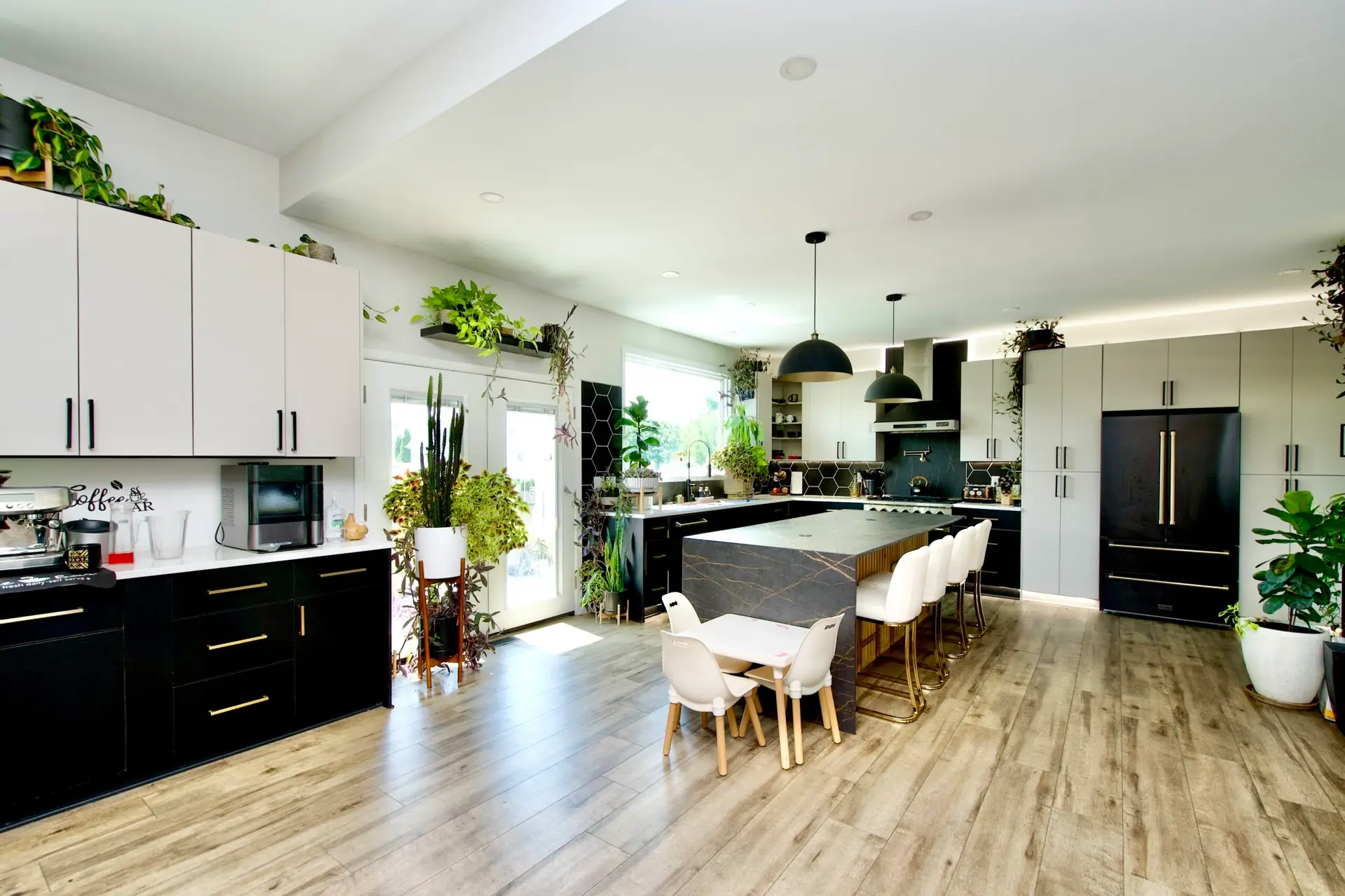 Open kitchen layout with modern finishes in a Gainesville VA full-home renovation