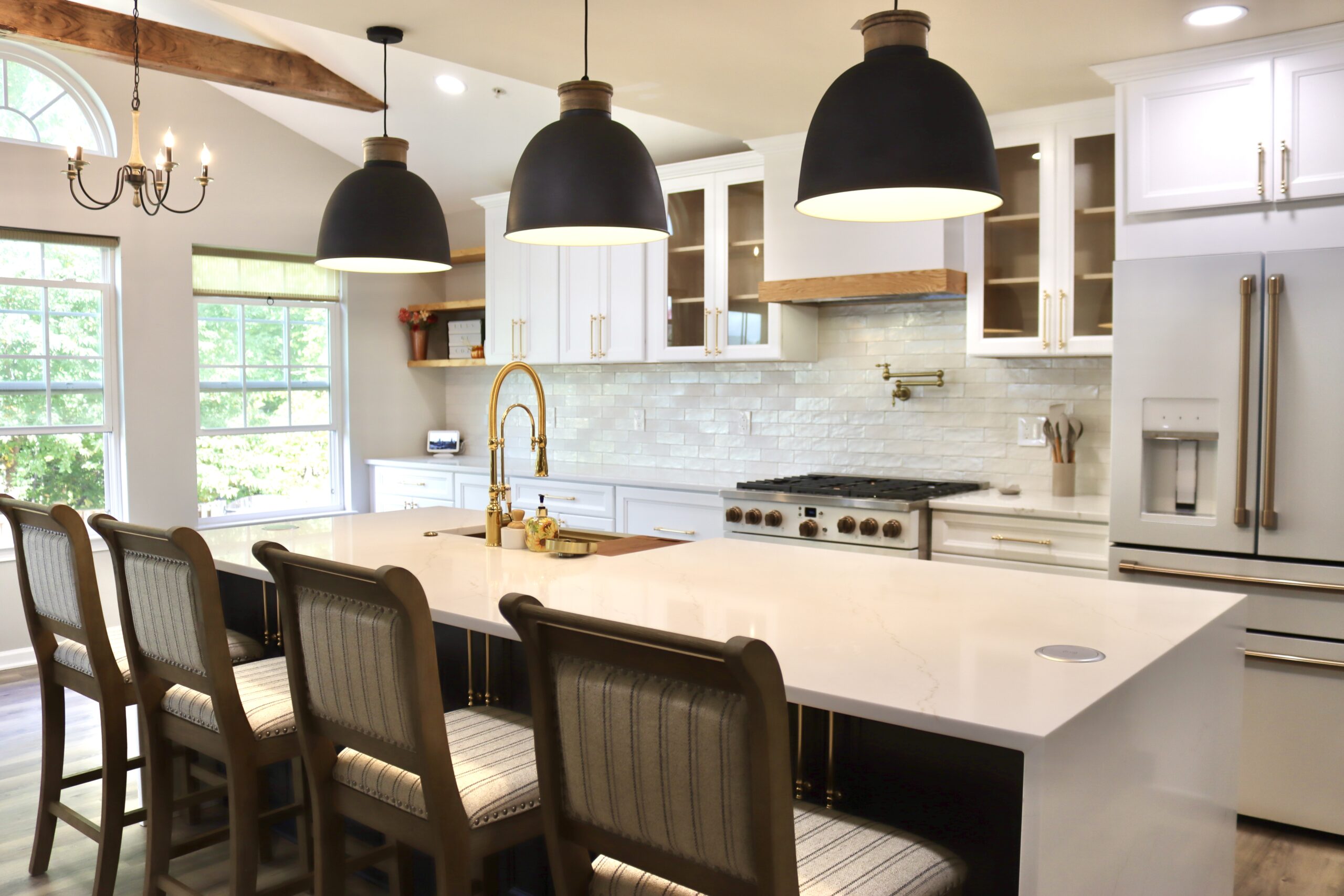 Large kitchen island with sink in French country kitchen remodel Haymarket VA