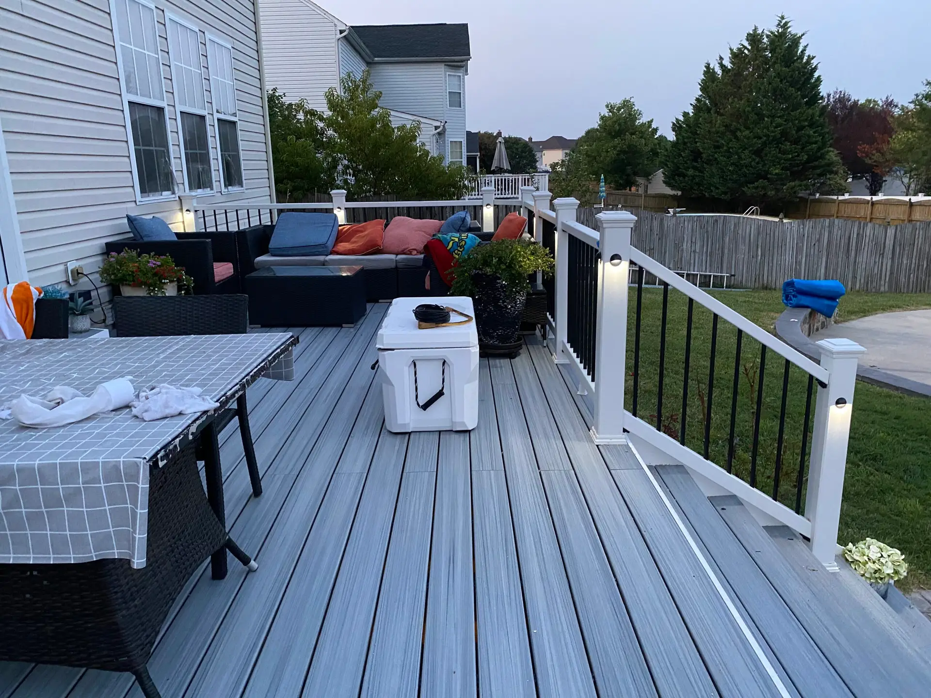 Deck railing with integrated LED post lights in Warrenton, Virginia