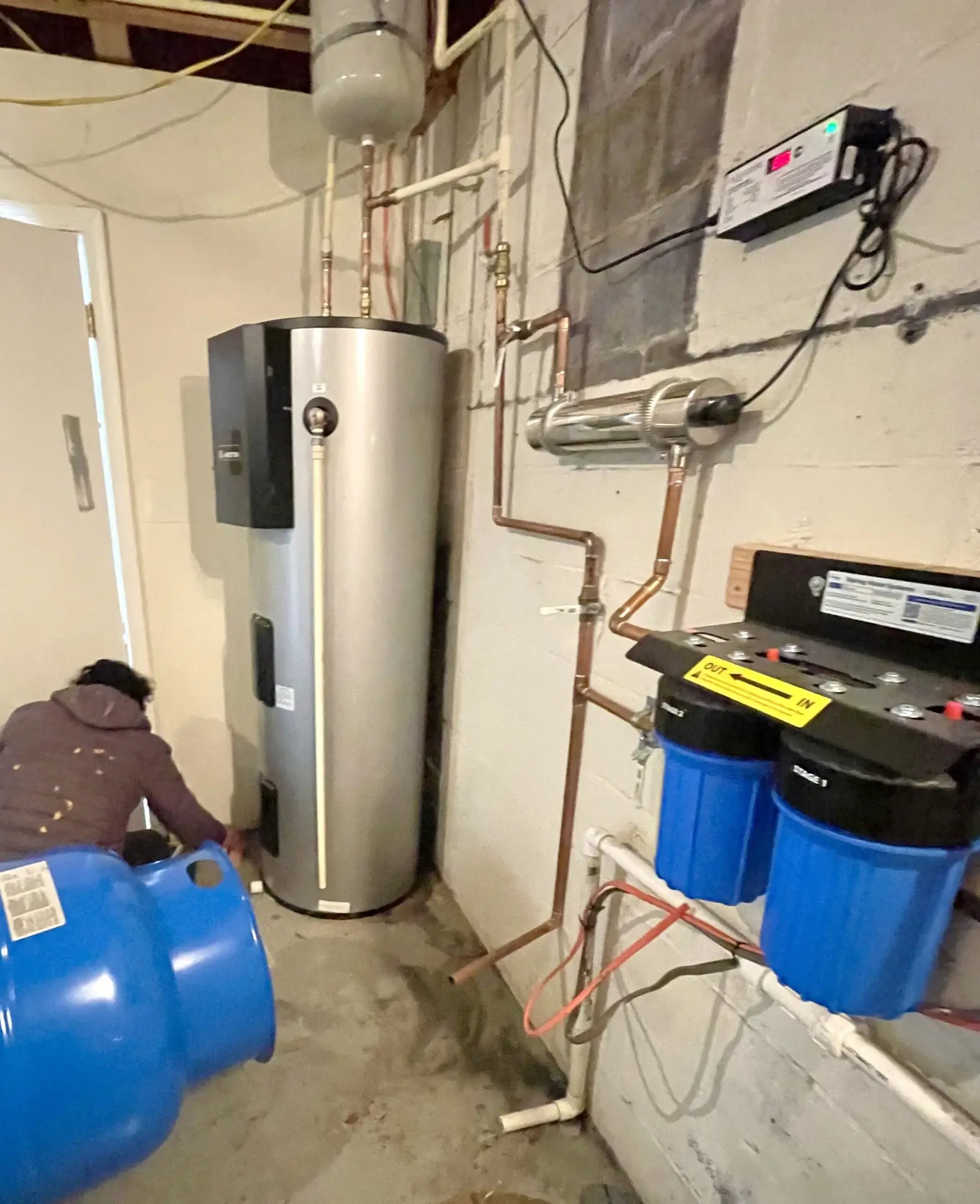 Gas tankless water heater intake and exhaust piping installed in Warrenton Virginia home